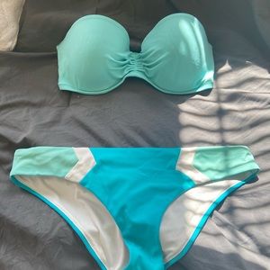 Real and light blue bathing suit